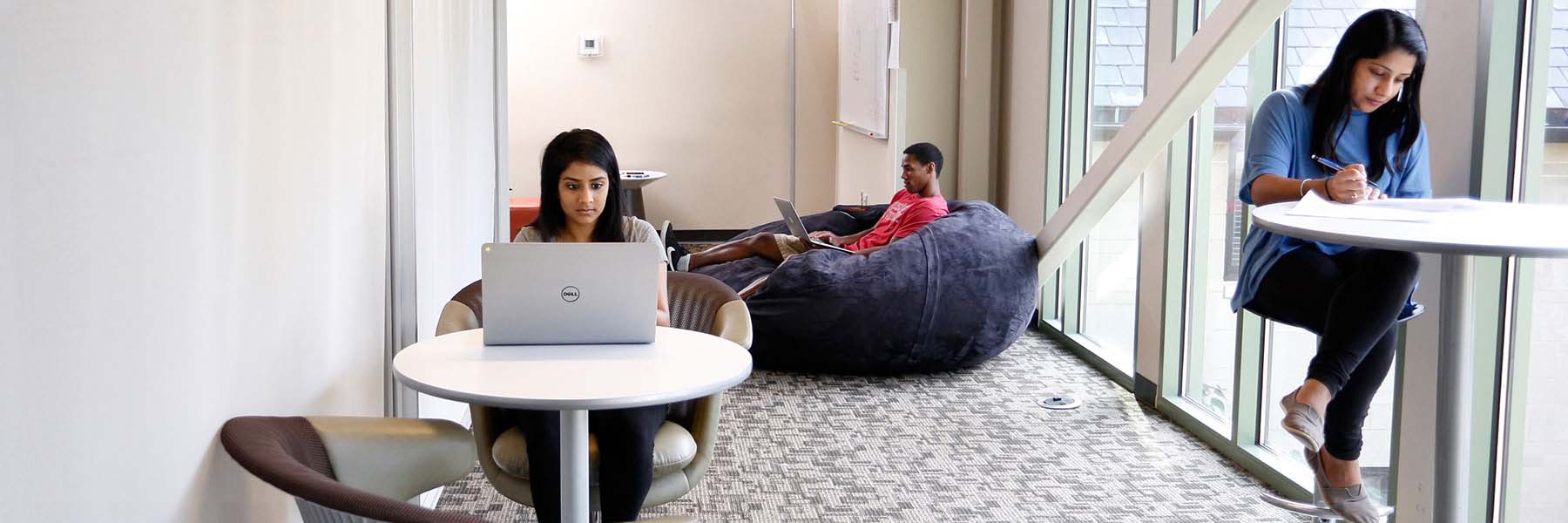 Students sit and study in the Informatics Connector.